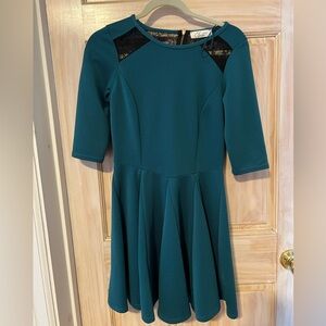 Green dress with black lace back cut out size 12
